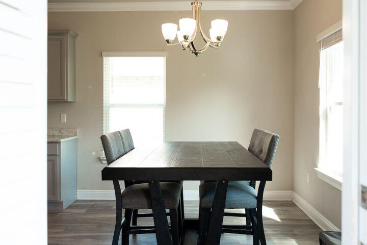 271 Wayne Trail Santa Rosa Beach, FL 32459 - Photo 18 of 42 a view of a dining room with furniture and window