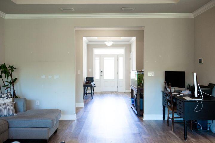 271 Wayne Trail Santa Rosa Beach, FL 32459 - Photo 6 of 42 a living room with furniture and a flat screen tv