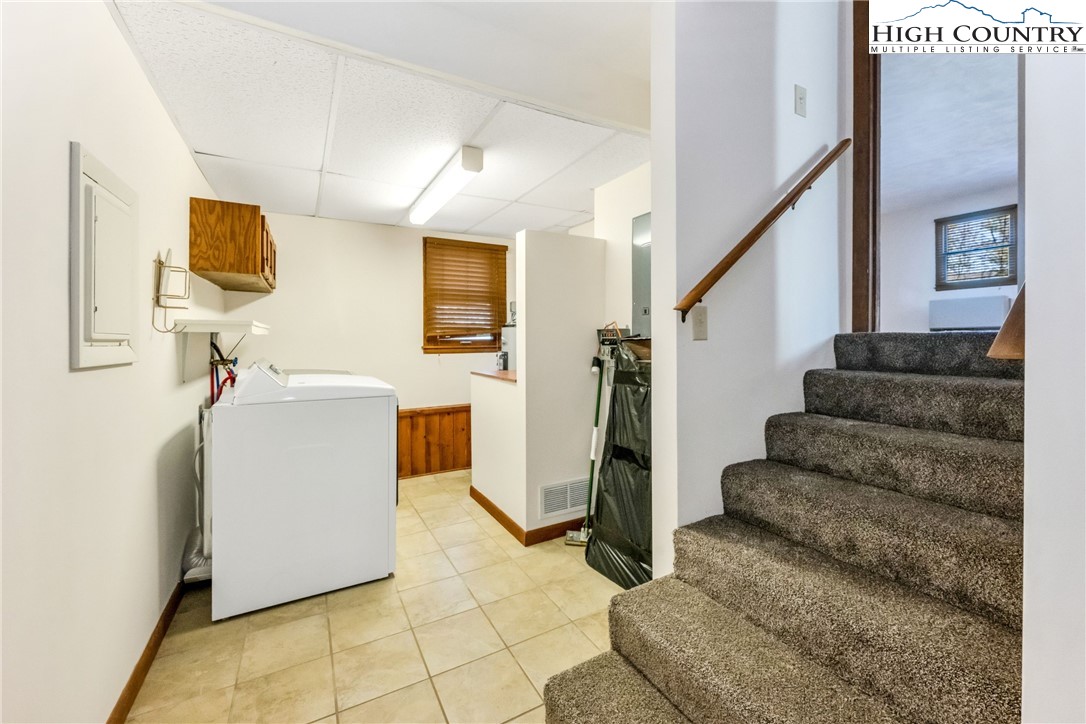 1324 Ripshin Road Troutdale, VA 24378 - Photo 24 of 47 a view of staircase with furniture and a window