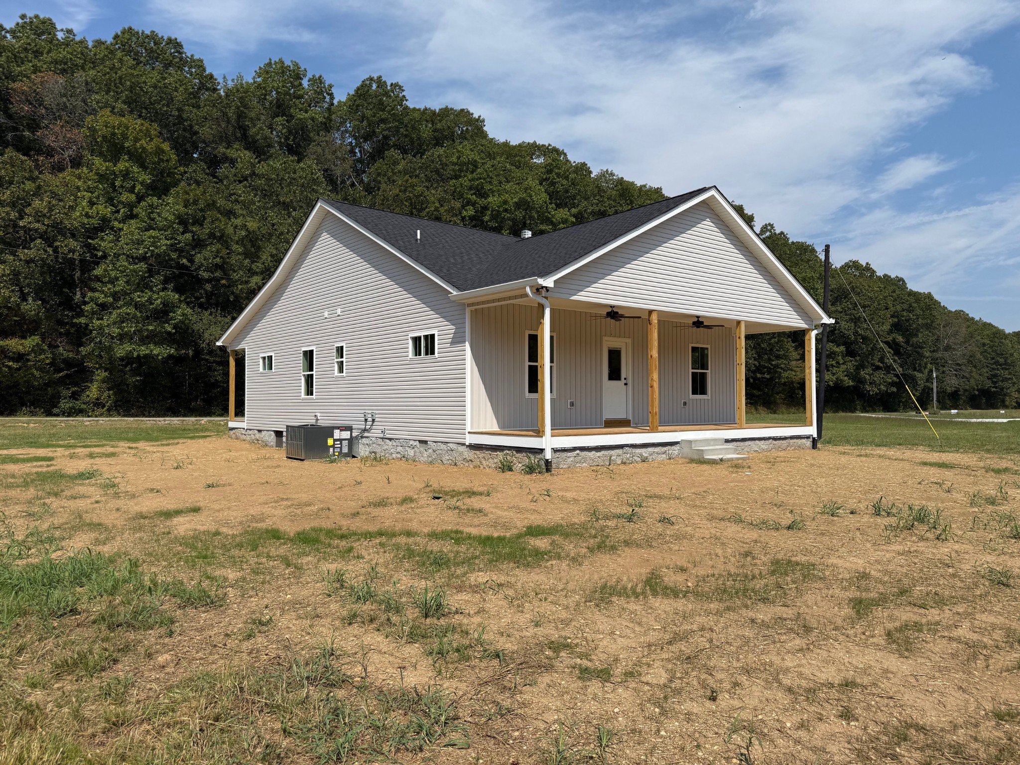 1572 Gilliam Hollow Road Dickson, TN 37055 - Photo 2 of 16 a view of a house with a yard