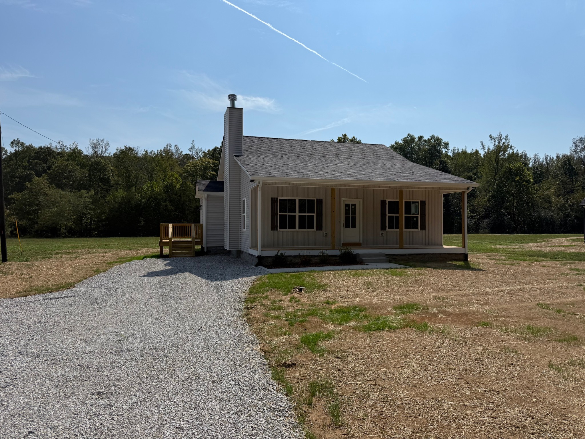 1572 Gilliam Hollow Road Dickson, TN 37055 - Photo 3 of 16 a front view of a house with a yard