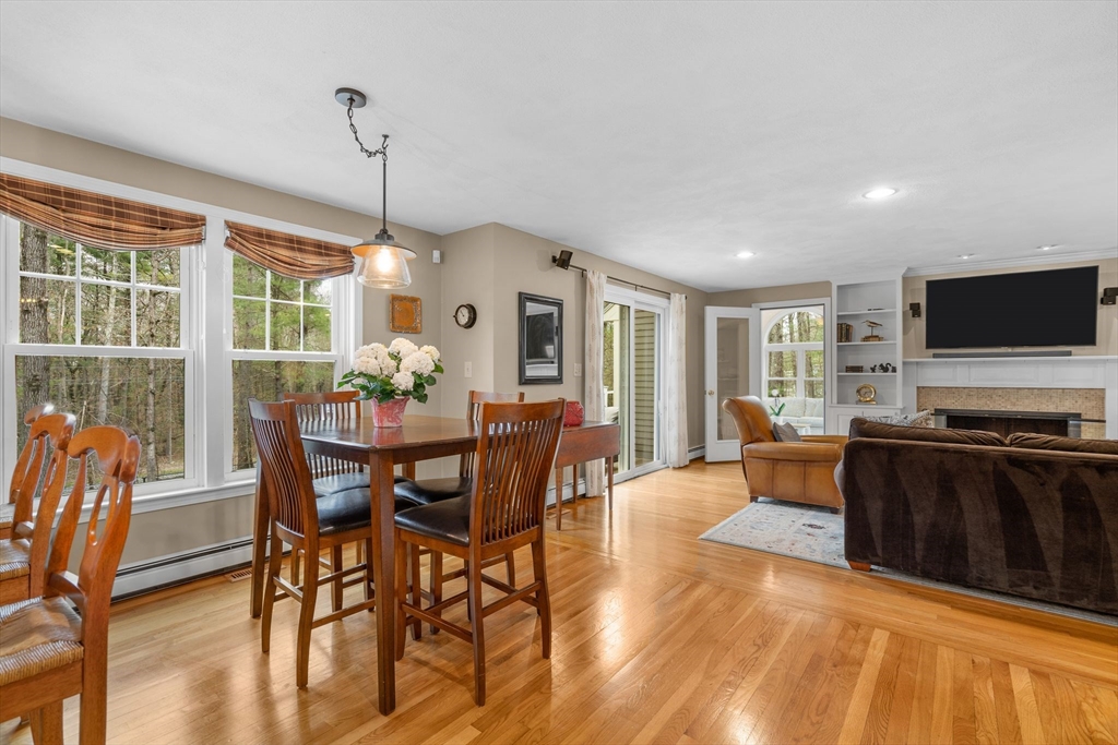 14 Hunters Road Boxford, MA 01921 - Photo 17 of 42 a view of a dining room with furniture window and wooden floor