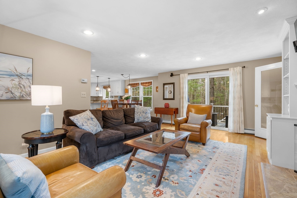 14 Hunters Road Boxford, MA 01921 - Photo 19 of 42 a living room with furniture wooden floor and a large window