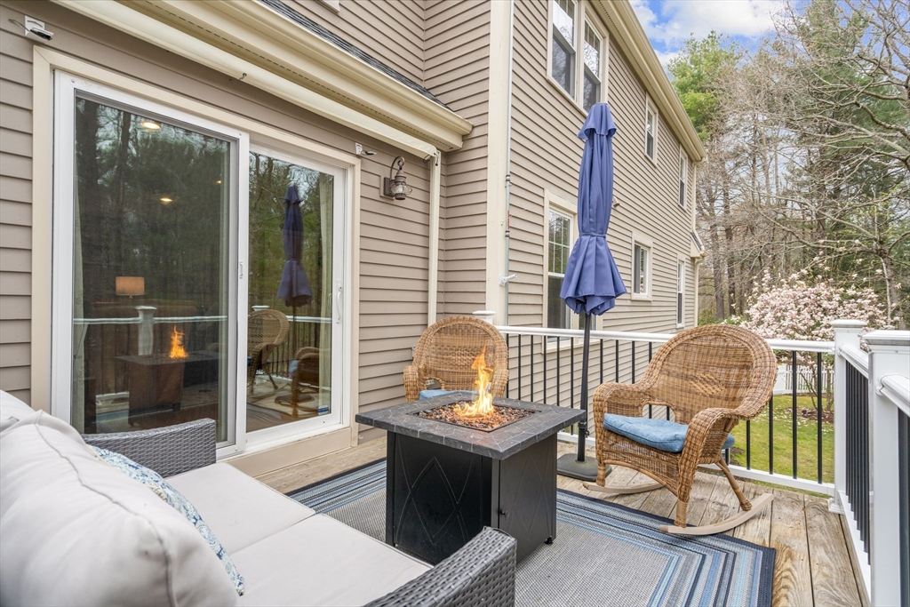 14 Hunters Road Boxford, MA 01921 - Photo 23 of 42 a view of a balcony with couch