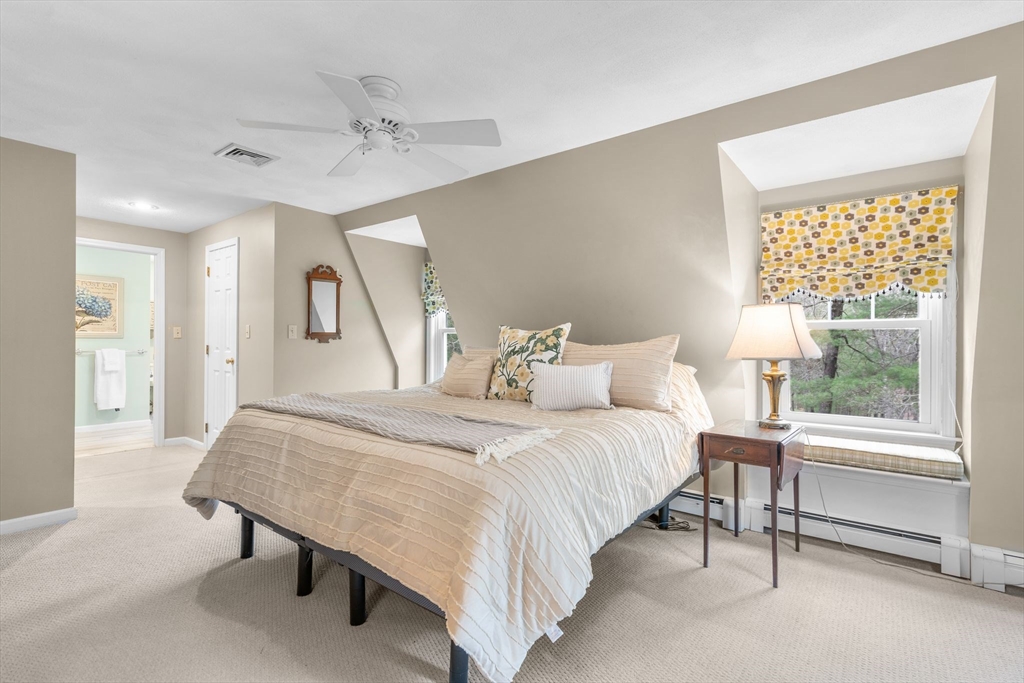 14 Hunters Road Boxford, MA 01921 - Photo 27 of 42 a spacious bedroom with a bed and a window