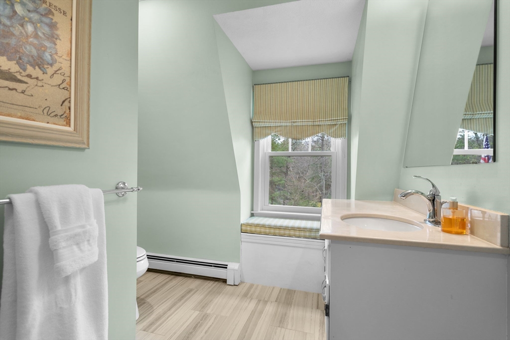 14 Hunters Road Boxford, MA 01921 - Photo 29 of 42 a bathroom with a sink and a mirror
