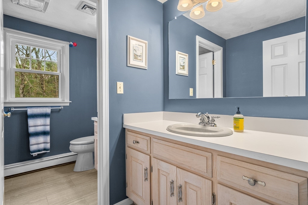 14 Hunters Road Boxford, MA 01921 - Photo 33 of 42 a bathroom with a sink and a toilet