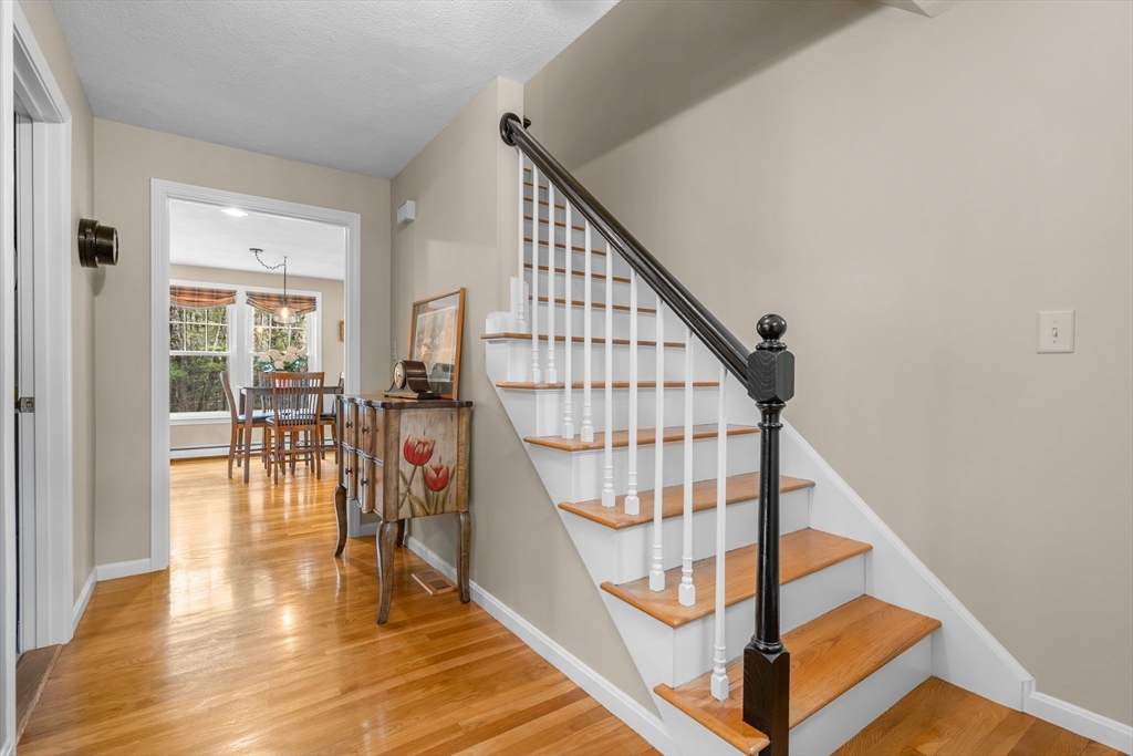14 Hunters Road Boxford, MA 01921 - Photo 8 of 42 a view of entryway and hall with wooden floor