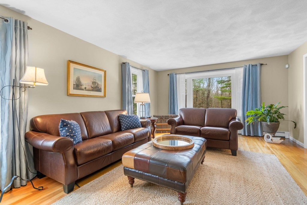 14 Hunters Road Boxford, MA 01921 - Photo 9 of 42 a living room with furniture and a large window