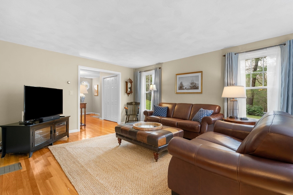 14 Hunters Road Boxford, MA 01921 - Photo 10 of 42 a living room with furniture and a flat screen tv