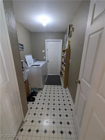 a bathroom with a sink a toilet a shower and a mirror