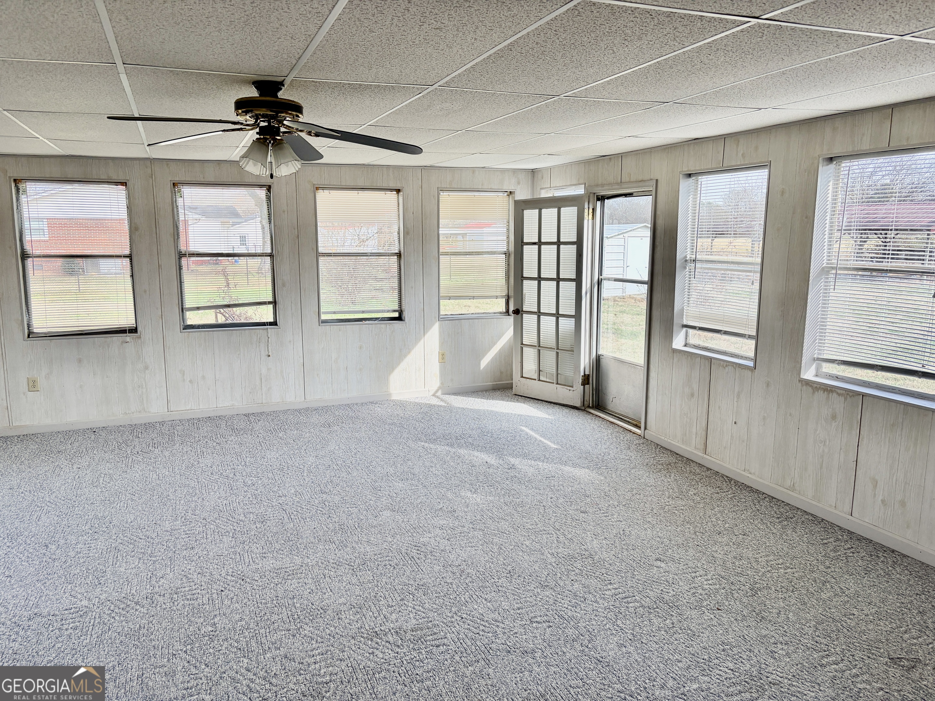 310 McDaniel Station Road Southwest Calhoun, GA 30701 - Photo 5 of 11 a view of an empty room with a window