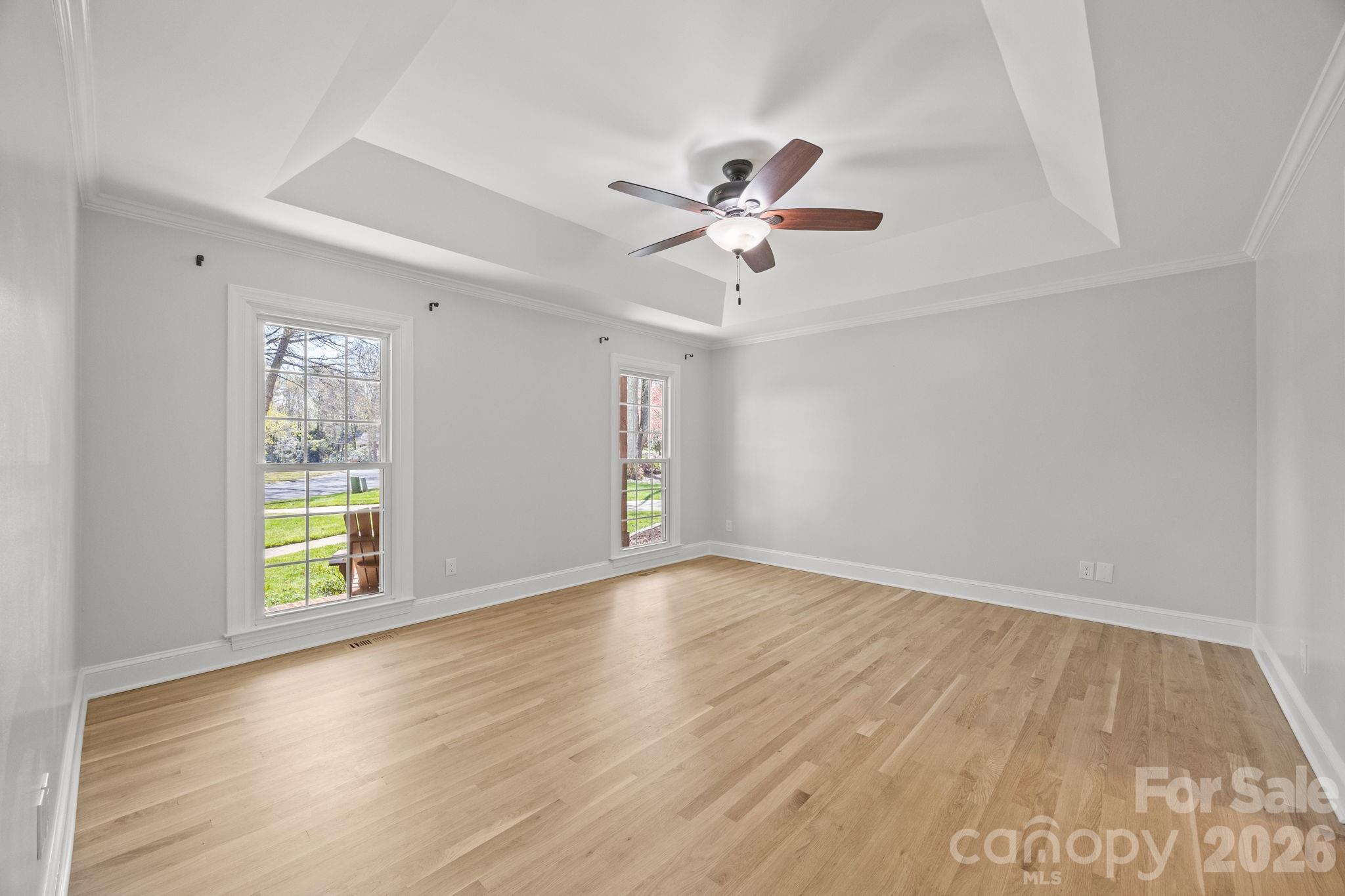 5243 Mintridge Road Mint Hill, NC 28227 - Photo 19 of 43 a view of an empty room with window and wooden floor