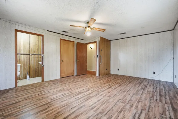 a bathroom with a sink a mirror and a shower curtain