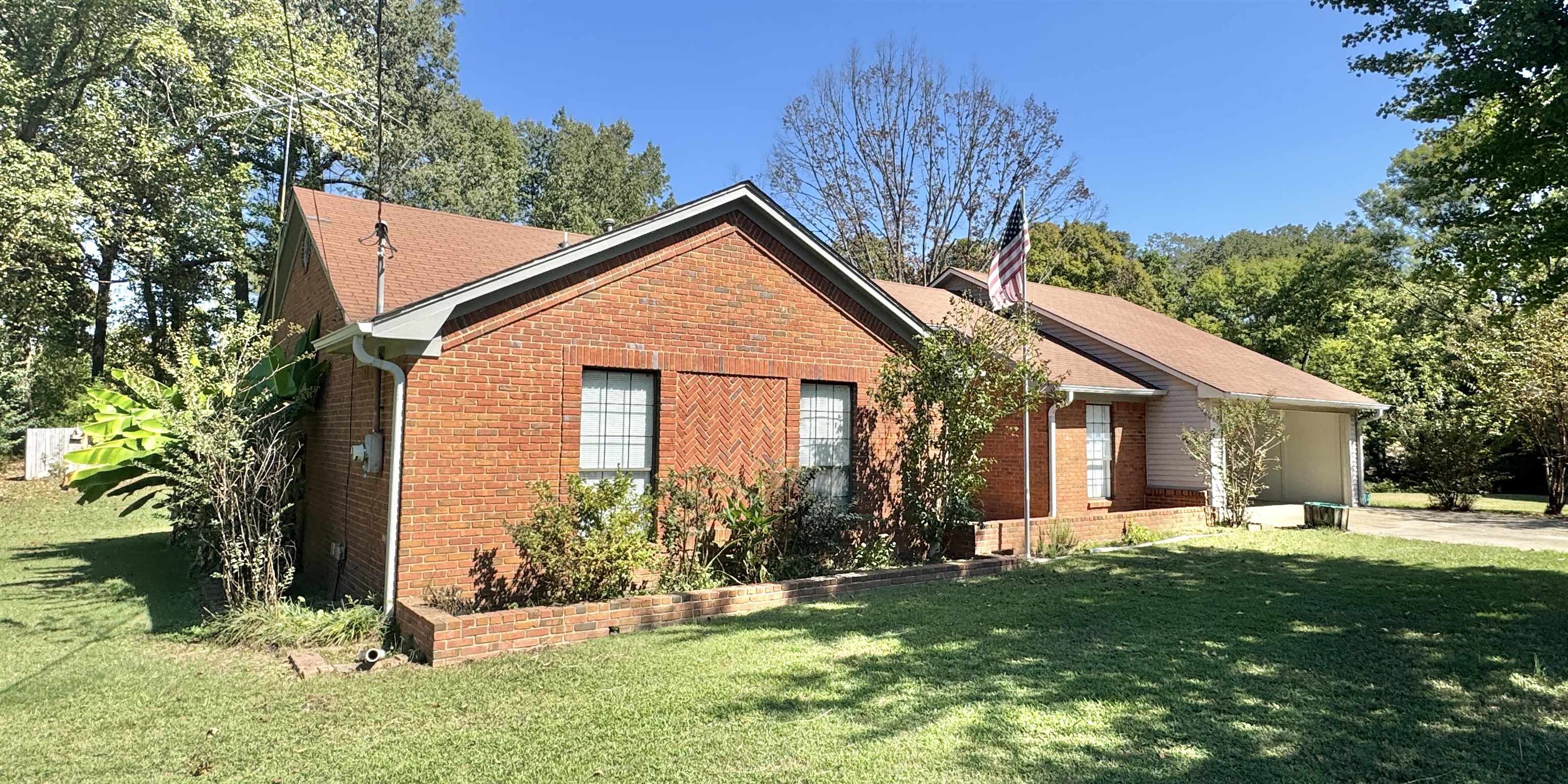610 Hanna Drive Ripley, TN 38063 - Photo 21 of 23 a front view of house with yard and green space
