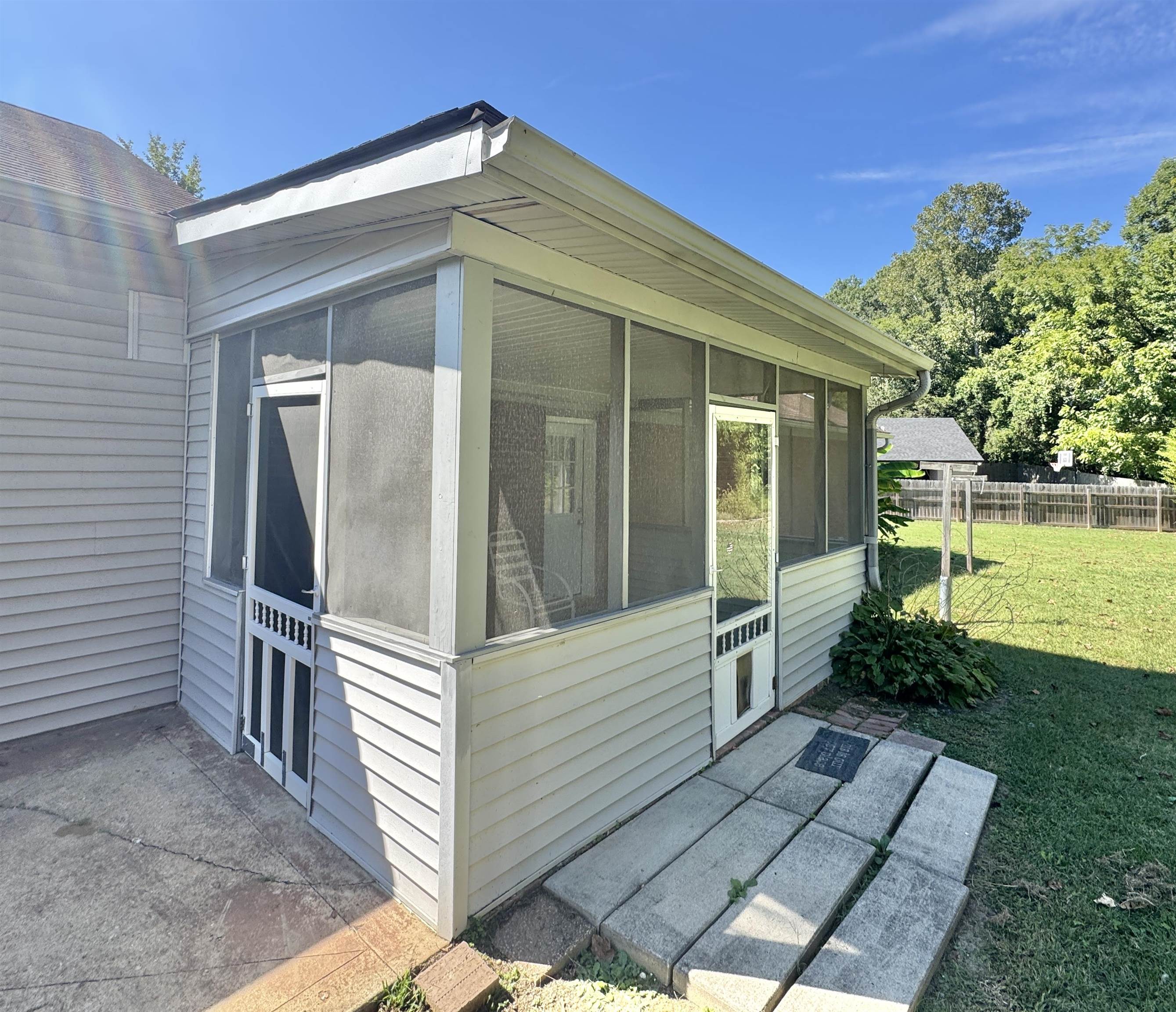 610 Hanna Drive Ripley, TN 38063 - Photo 4 of 23 a view of a house with a yard