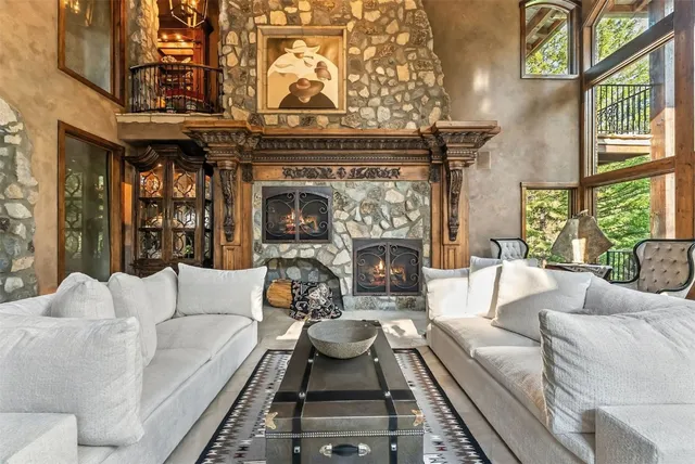 a view of a patio with table and chairs and wooden floor