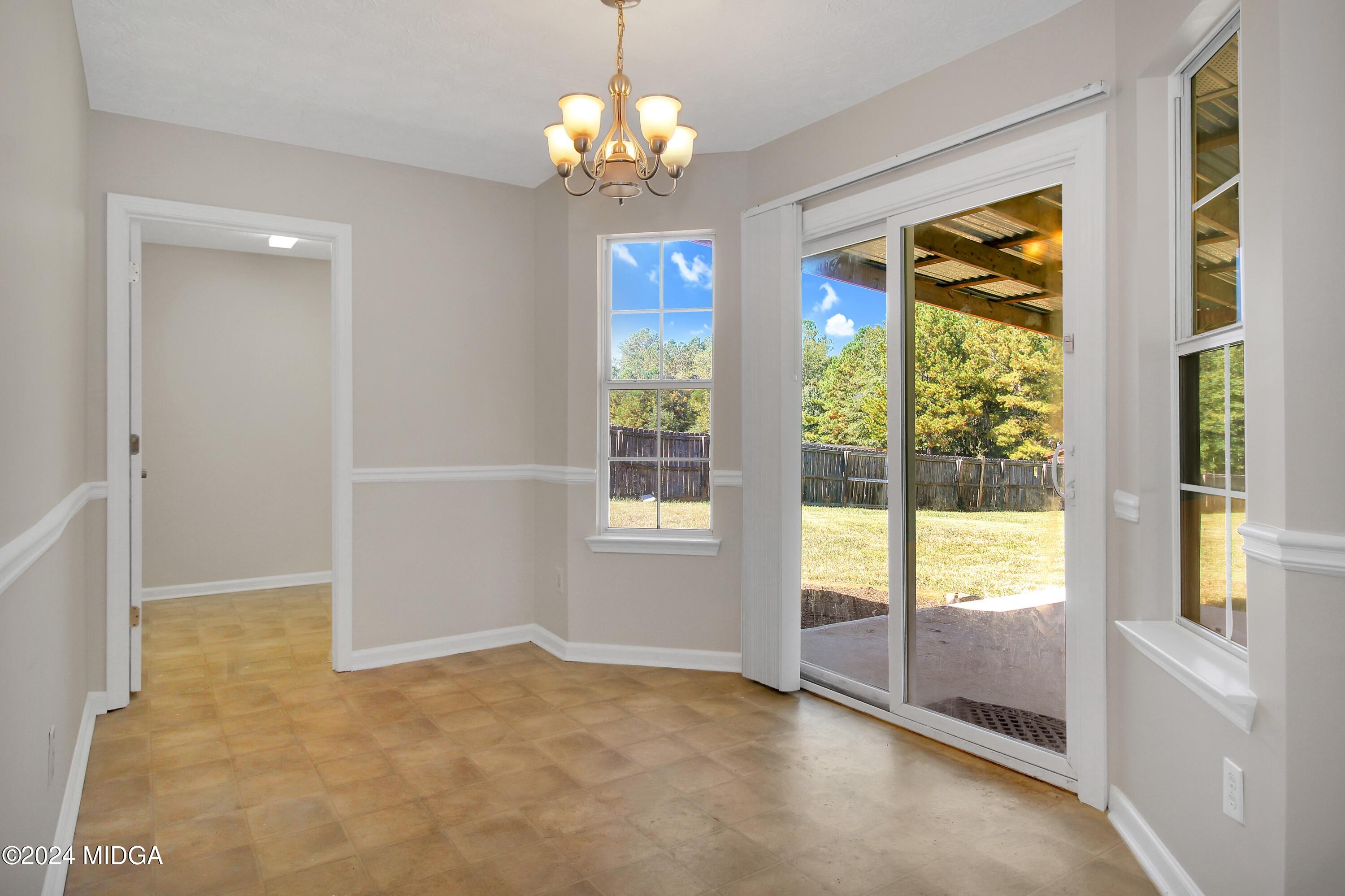 106 Meadow View Drive Jackson, GA 30233 - Photo 13 of 40 a view of an empty room with a window