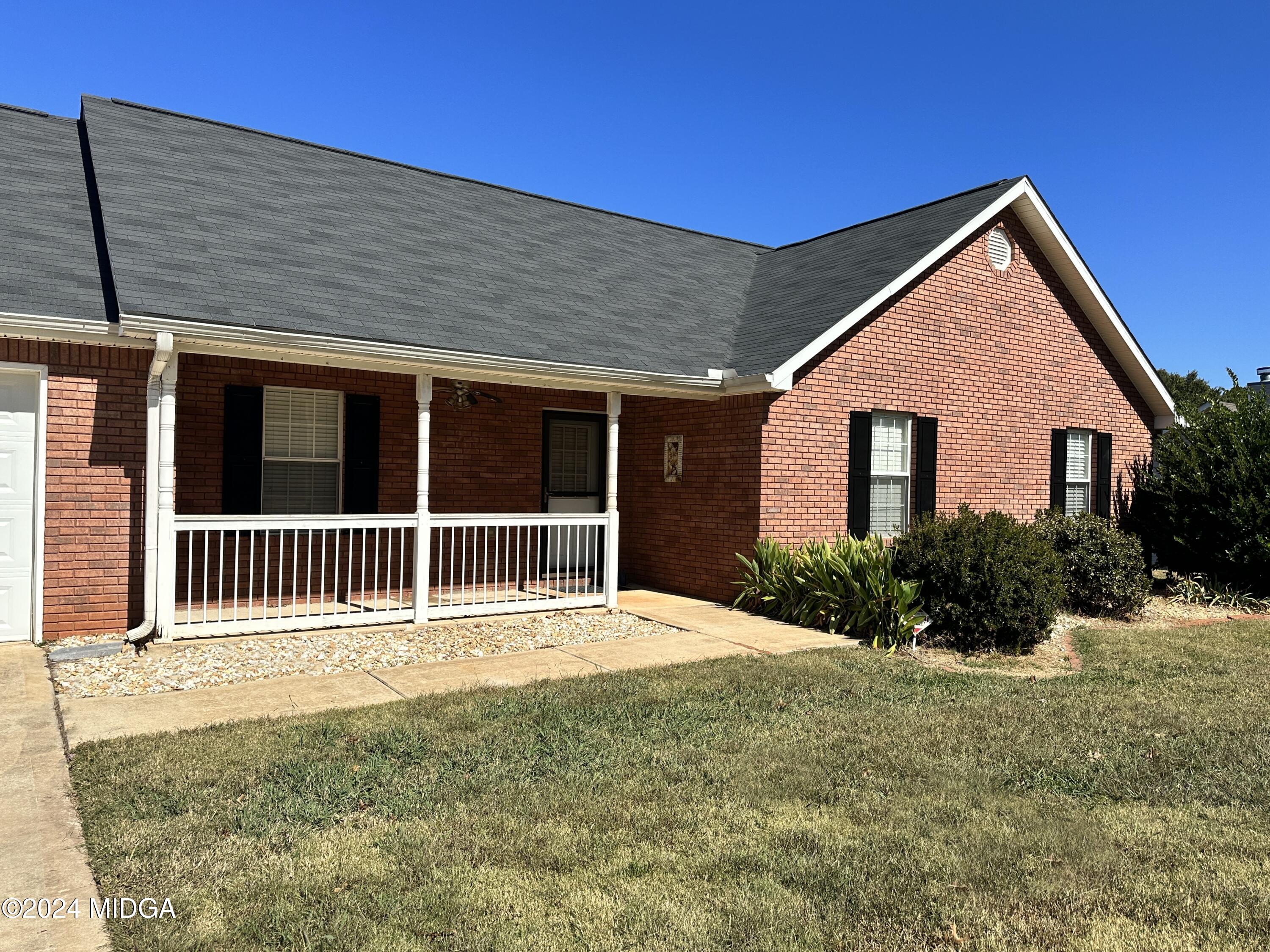 106 Meadow View Drive Jackson, GA 30233 - Photo 35 of 40 a front view of a house with a yard