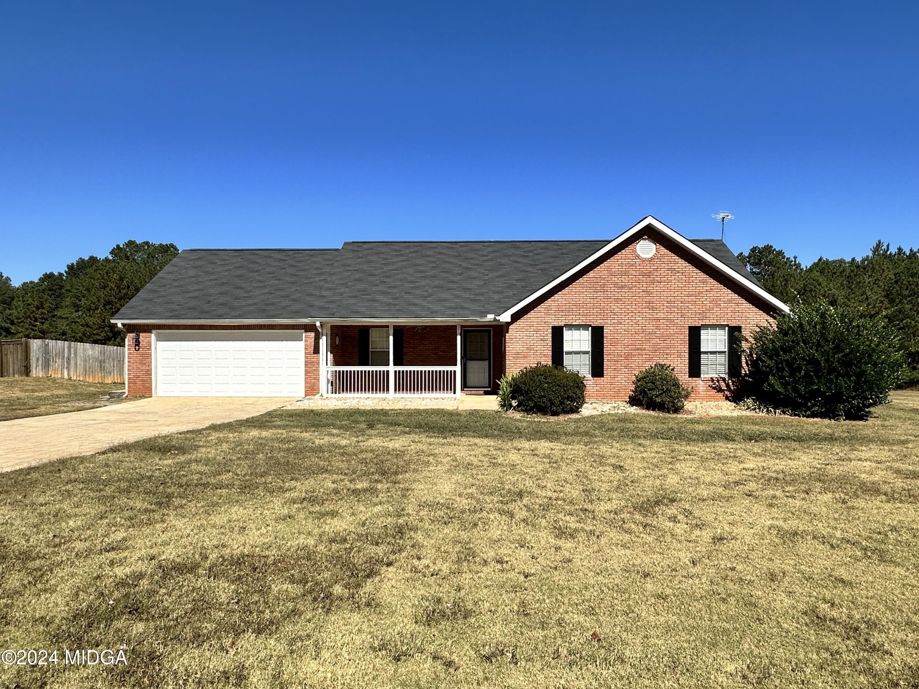 106 Meadow View Drive Jackson, GA 30233 - Photo 37 of 40 a view of a house with a yard