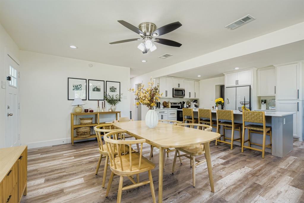 a view of a dining room with furniture