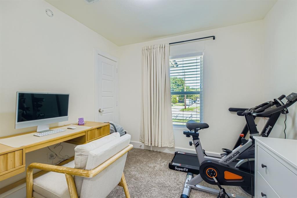 1601 Rindie Street Irving, TX 75060 - Photo 13 of 29 a work room with furniture and windows