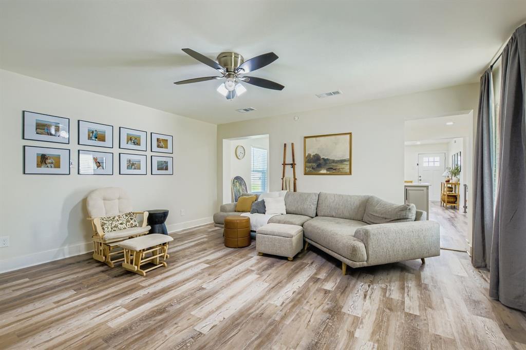 1601 Rindie Street Irving, TX 75060 - Photo 3 of 29 a living room with furniture and a window