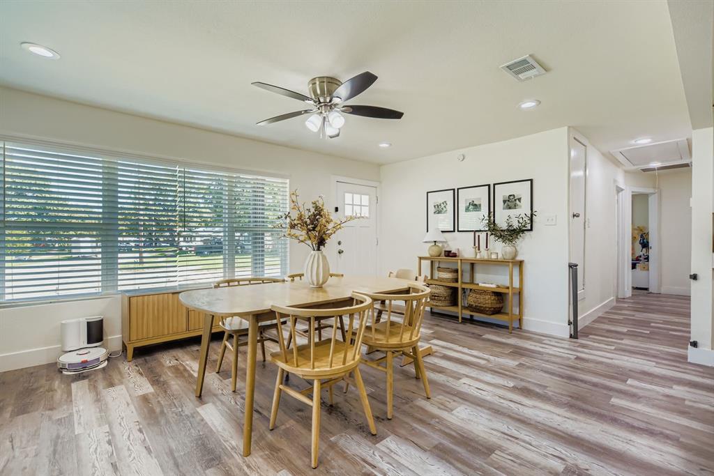 1601 Rindie Street Irving, TX 75060 - Photo 5 of 29 a view of a dining room with furniture window and wooden floor