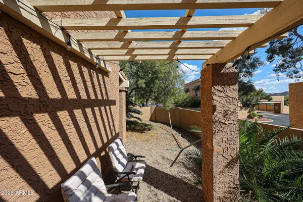 a view of balcony with wooden floor