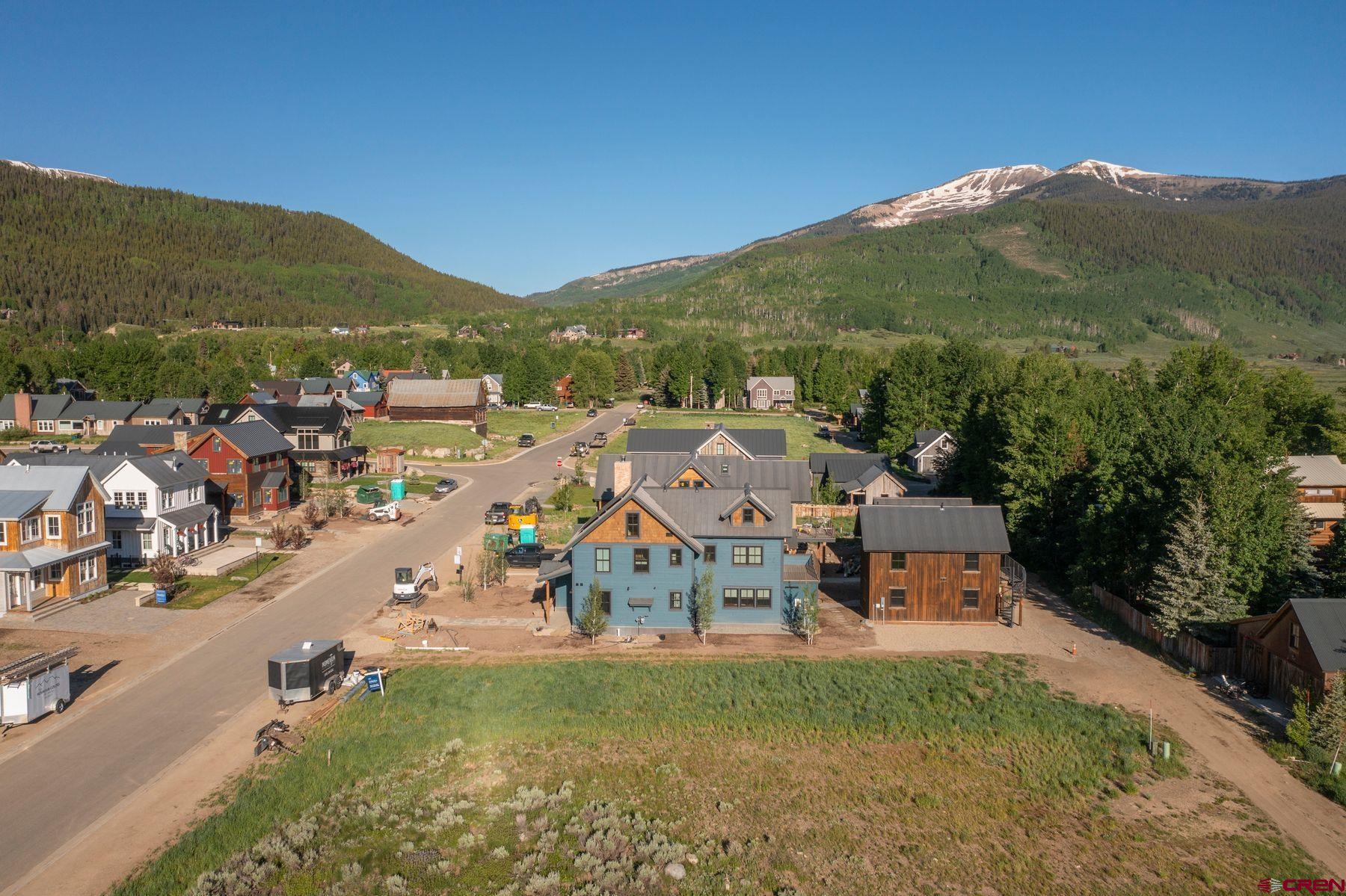 520 Teocalli Avenue Crested Butte, CO 81224 - Photo 5 of 11 a view of a city with mountains in the background