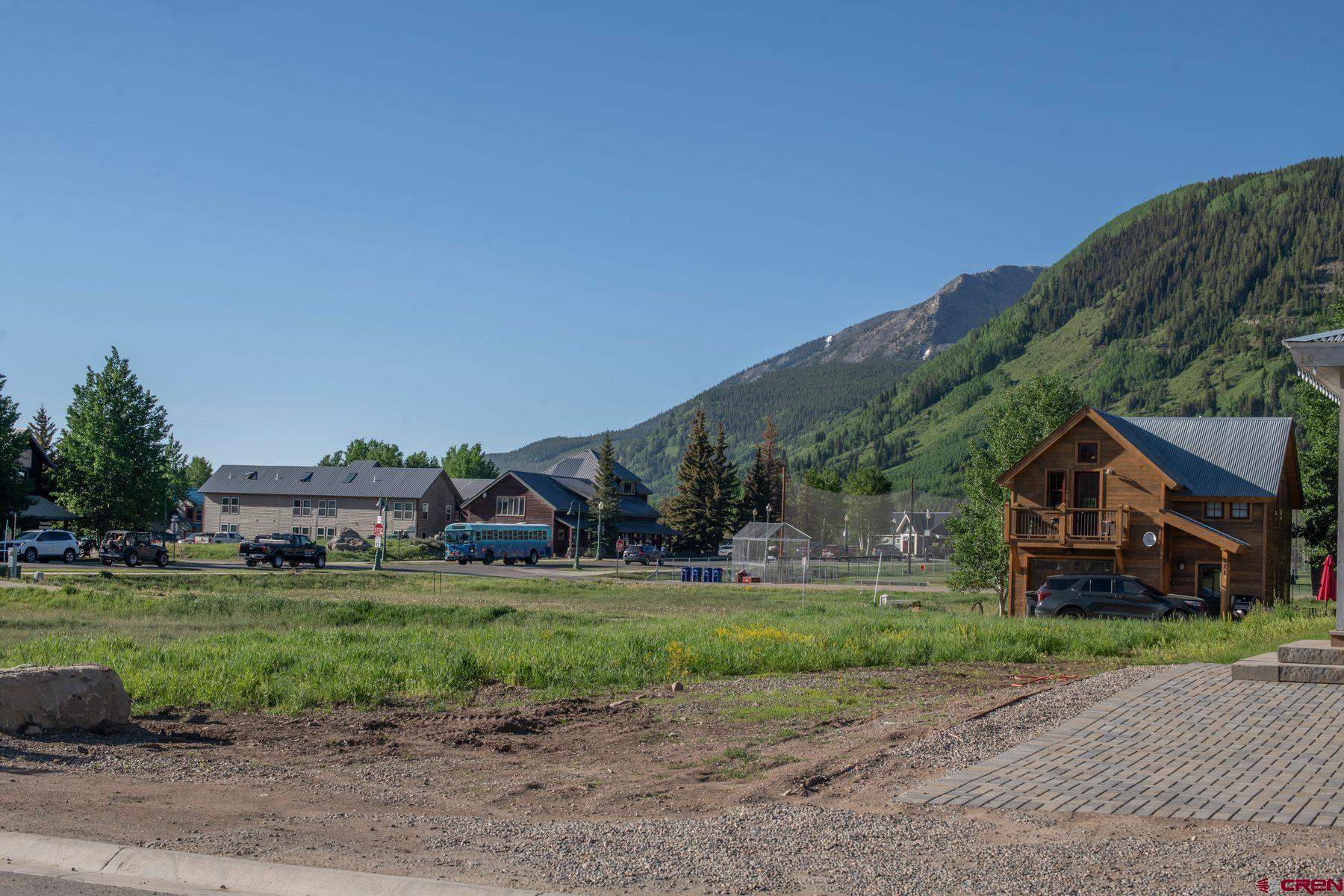 520 Teocalli Avenue Crested Butte, CO 81224 - Photo 8 of 11 a view of a house with a big yard