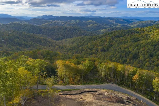 a view of a lake with mountains in the background