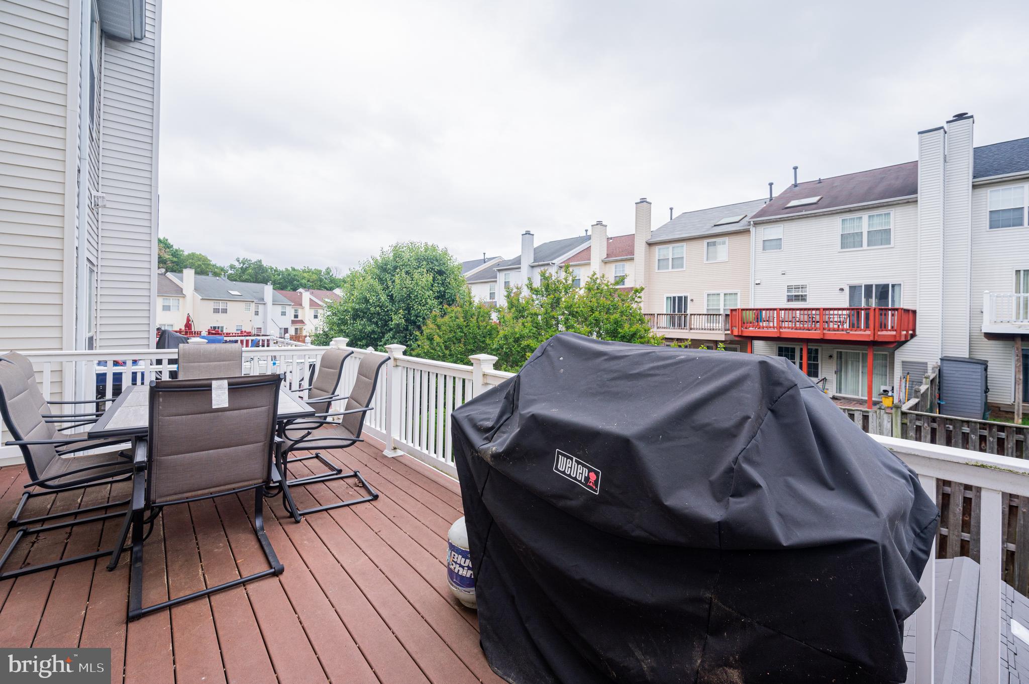 8617 Otter Creek Road Laurel, MD 20724 - Photo 5 of 34 Trex composite deck with vinyl railings