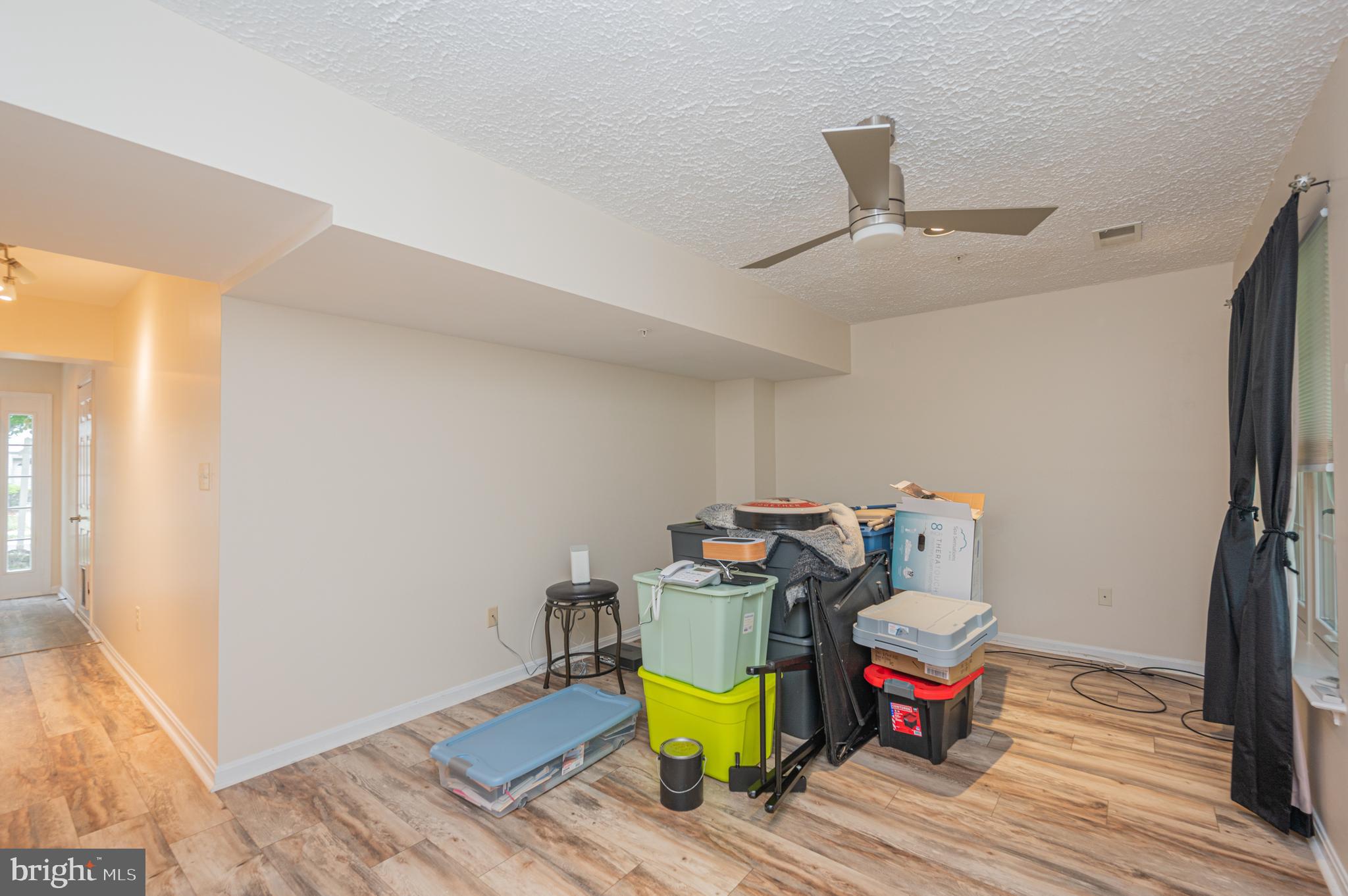 8617 Otter Creek Road Laurel, MD 20724 - Photo 9 of 34 Family Room with lighted ceiling fan