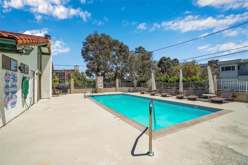 745 Main Street, Unit 107 El Segundo, CA 90245 - Photo 30 of 38 a swimming pool with outdoor seating and yard
