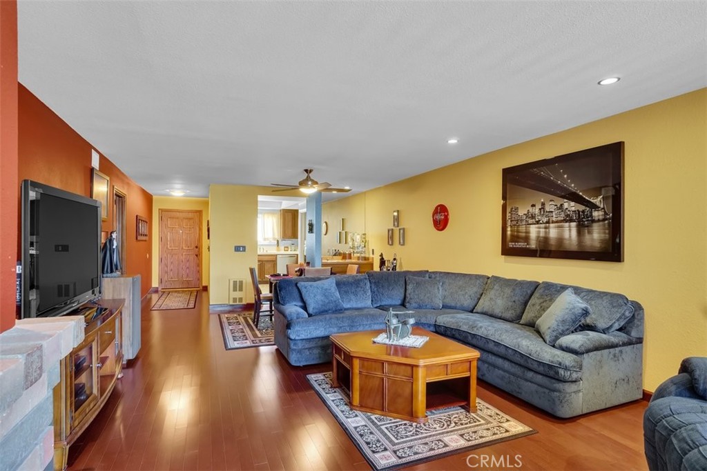 745 Main Street, Unit 107 El Segundo, CA 90245 - Photo 7 of 38 a living room with furniture and a flat screen tv