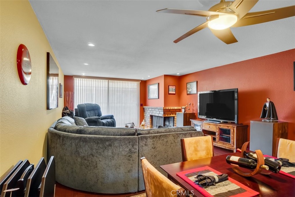 745 Main Street, Unit 107 El Segundo, CA 90245 - Photo 8 of 38 a living room with furniture and a flat screen tv