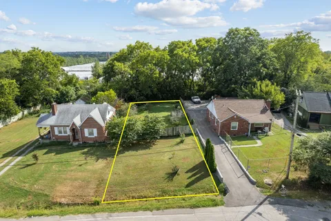 a view of a house with swimming pool