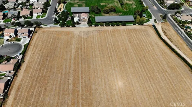 a view of a swimming pool with seating area