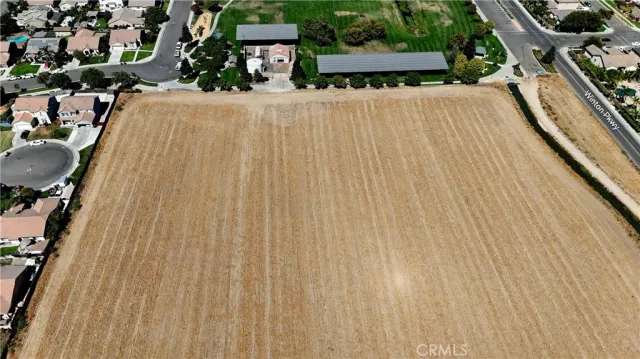 a view of a swimming pool with seating area