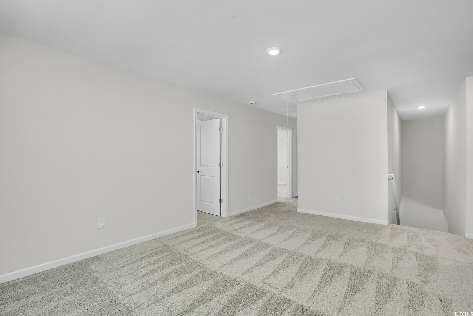 1113 Hainer Place Drive Conway, SC 29526 - Photo 16 of 28 Carpeted empty room with attic access and recessed lighting