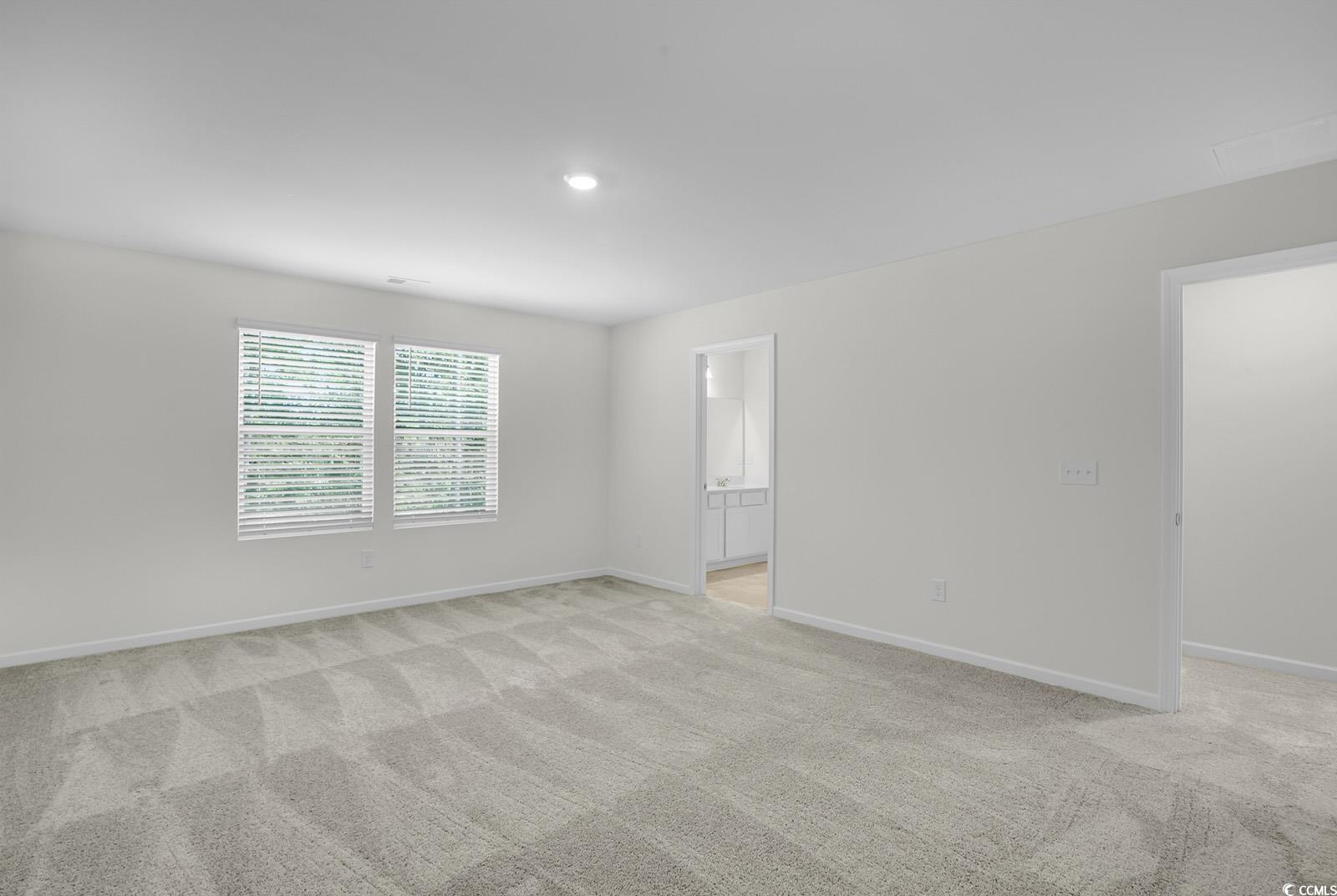 1113 Hainer Place Drive Conway, SC 29526 - Photo 20 of 28 Empty room with light colored carpet and recessed lighting