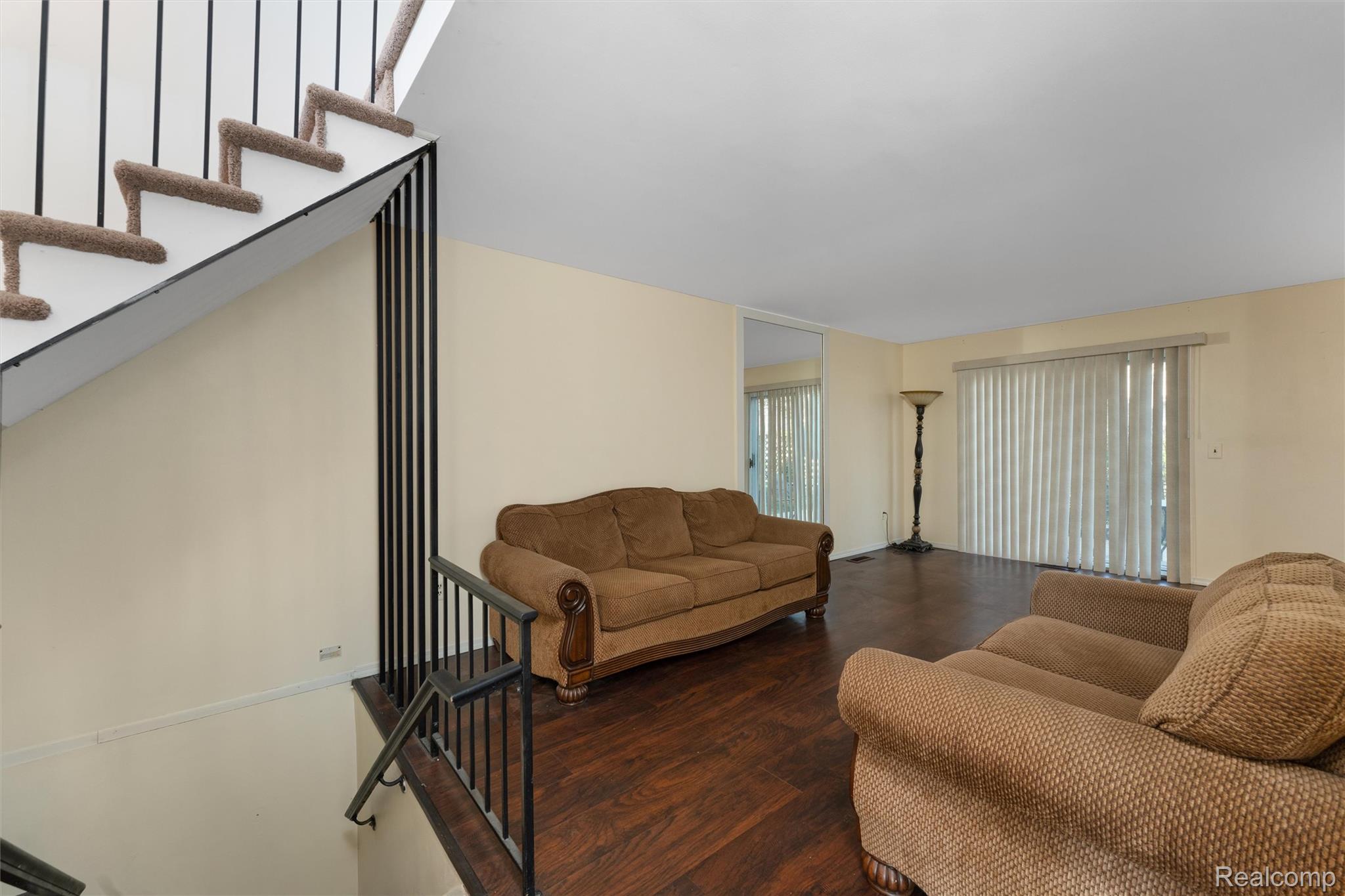 32105 West 12 Mile Road Farmington, MI 48334 - Photo 5 of 39 Living area with stairs and wood finished floors