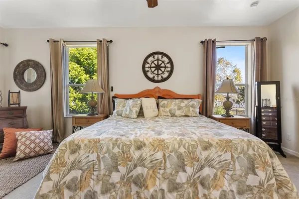 a bedroom with a bed and a dresser