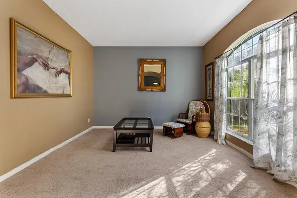 a view of livingroom with furniture and windows