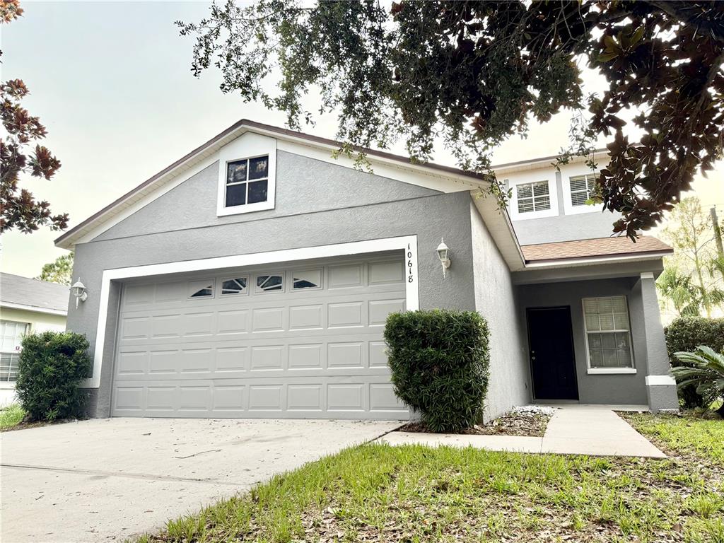 10618 Navigation Drive Riverview, FL 33579 - Photo 1 of 1 a view of a house with a yard and potted plants