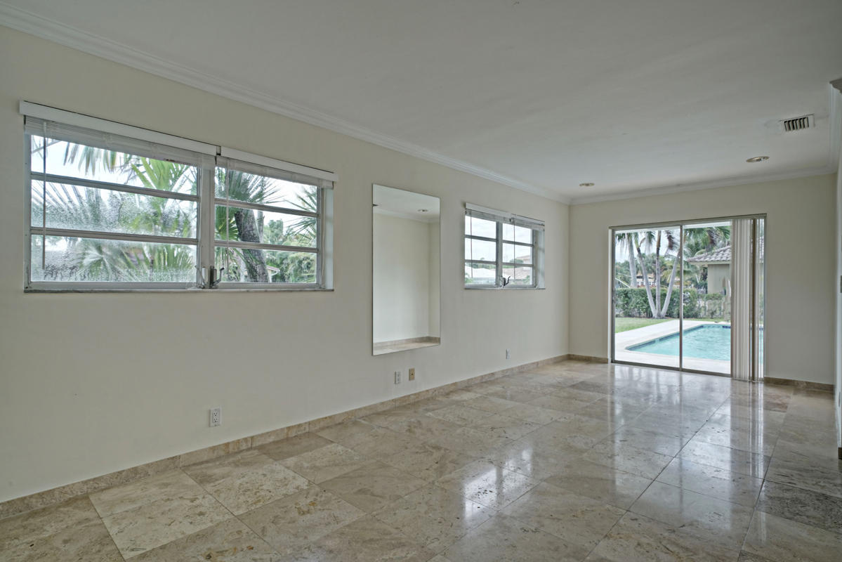 5600 Nassau Drive Boca Raton, FL 33487 - Photo 19 of 21 a view of an empty room with a window