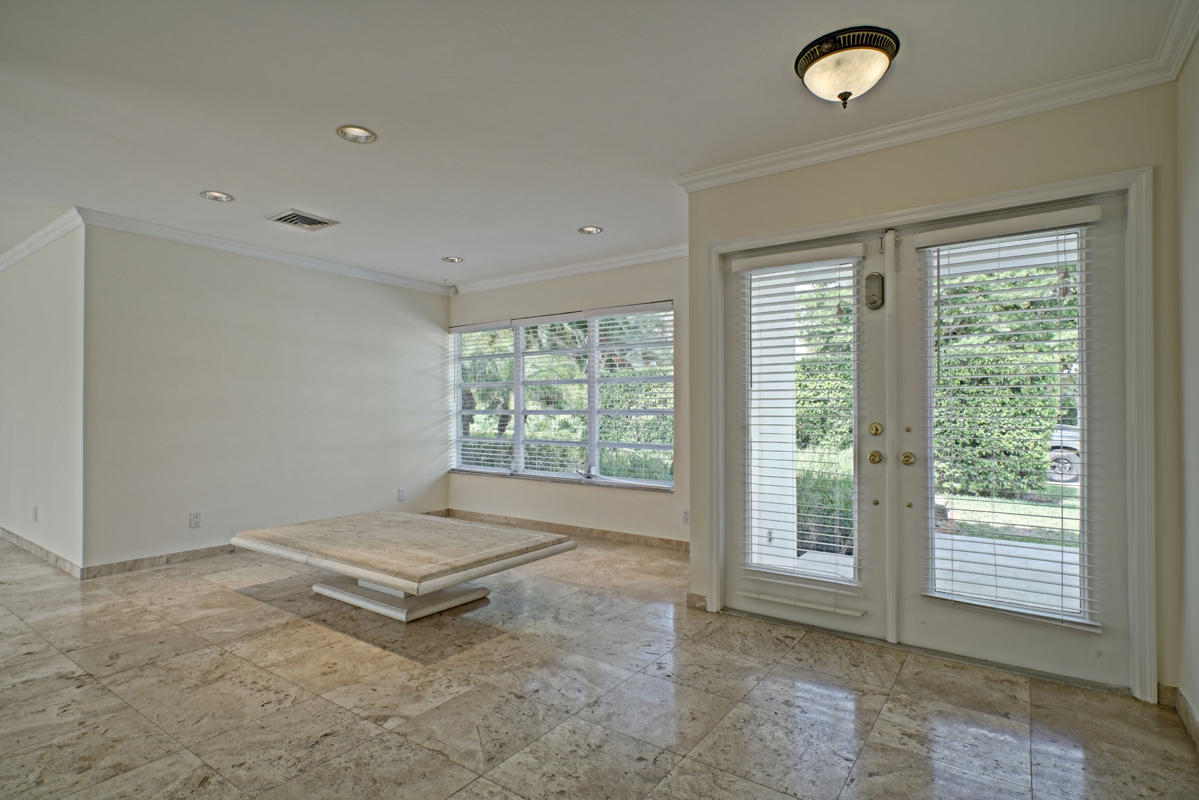 5600 Nassau Drive Boca Raton, FL 33487 - Photo 7 of 21 a living room with a window