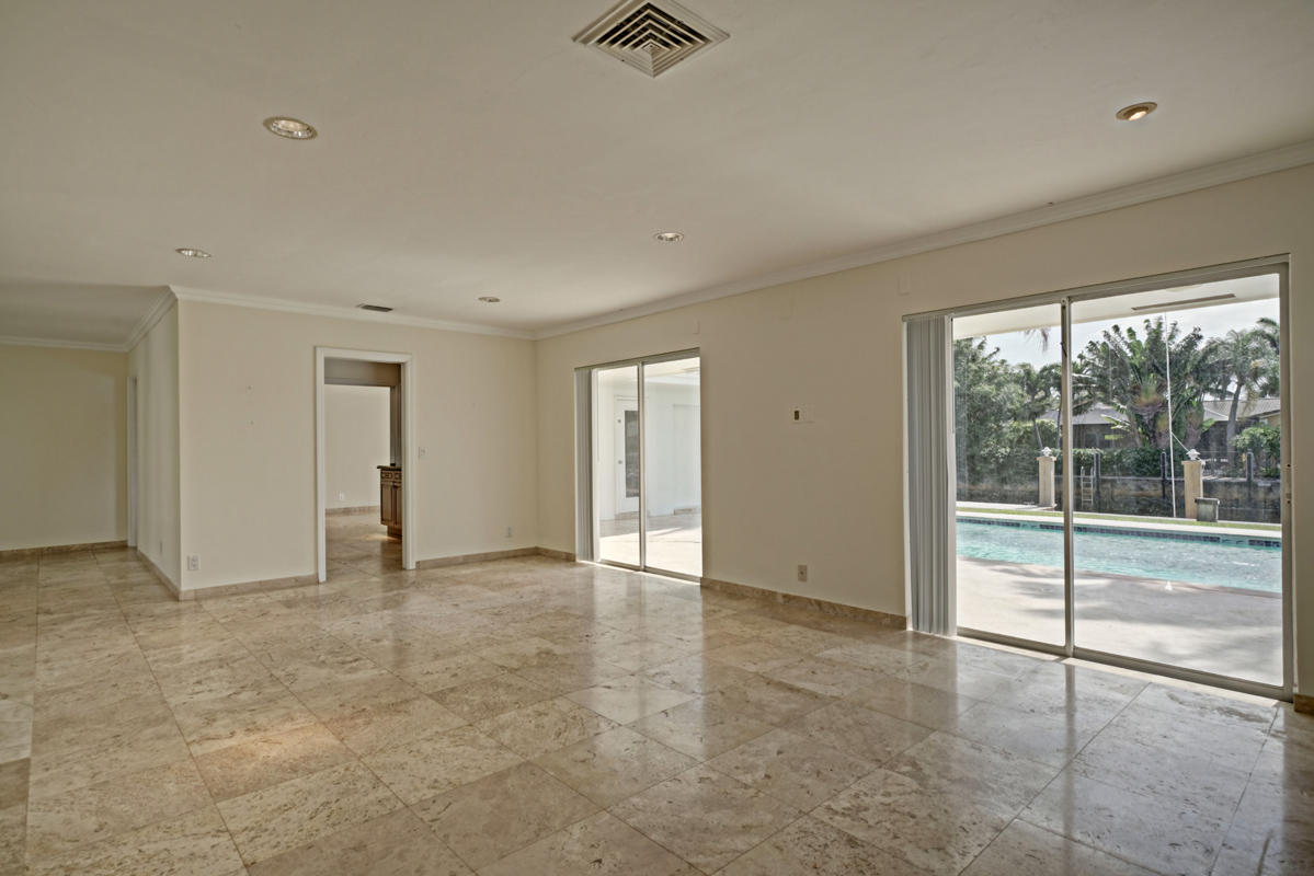 5600 Nassau Drive Boca Raton, FL 33487 - Photo 10 of 21 a view of an empty room with glass door