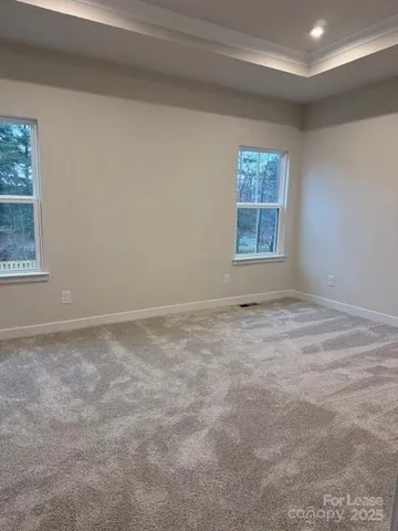a bathroom with a sink and glass door shower